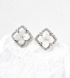 A pair of 18K White Gold Plated S925 Silver floral stud earrings with white mother-of-pearl flower centers and cubic zirconia halos