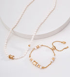 Adjustable freshwater pearl bracelet in vintage gold styled with pearl necklace — wasp-waist charm, round polished beads, pull-slide clasp, 18K gold plated S925 silver, BUCKLE Collective