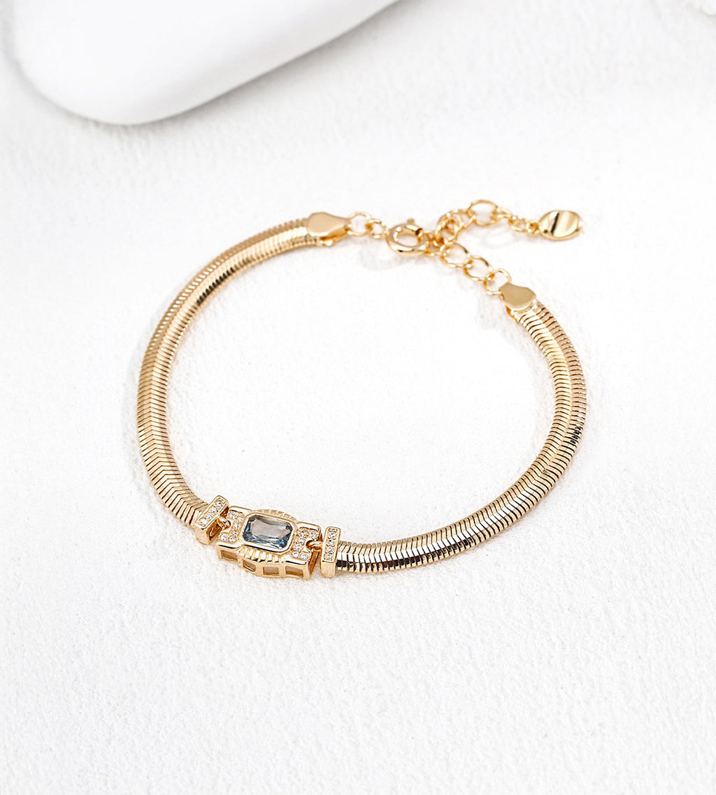 18K gold-plated S925 silver snake chain bracelet with an Art Deco-inspired rectangular CZ centre, lobster clasp and extension chain.