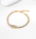 18K gold-plated S925 silver snake chain bracelet with an Art Deco-inspired rectangular CZ centre, lobster clasp and extension chain.