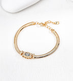 18K gold-plated S925 silver snake chain bracelet with an Art Deco-inspired rectangular CZ centre, lobster clasp and extension chain.