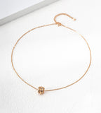 18K gold-plated S925 silver bamboo-barrel cubic zirconia necklace with a fine chain and extender on a white surface.