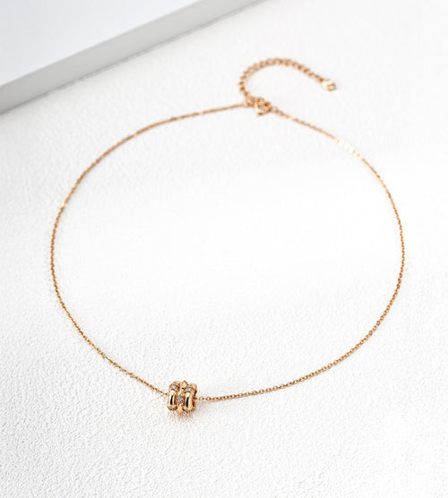 18K gold-plated S925 silver bamboo-barrel cubic zirconia necklace with a fine chain and extender on a white surface.