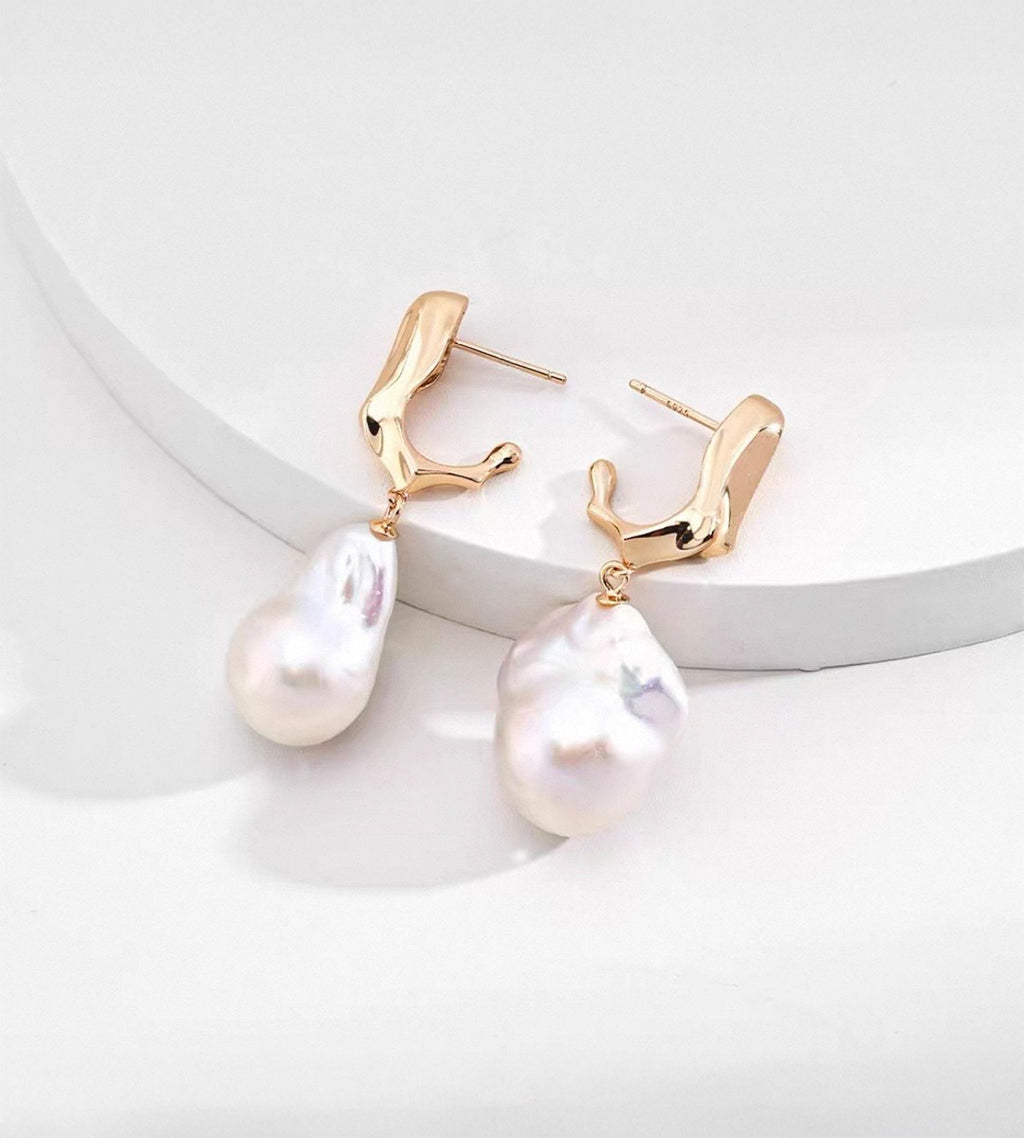 18K gold-plated S925 sterling silver baroque pearl drop earrings with sculptural tops on a white display
