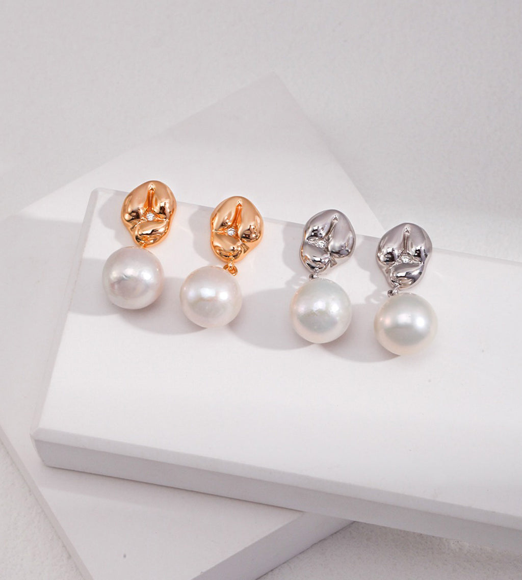 Two pairs of 18K gold-plated and 18K white-gold-plated S925 silver drop earrings with a polished gold dumpling-shaped top accented with cirzonia and a dangling baroque white pearl