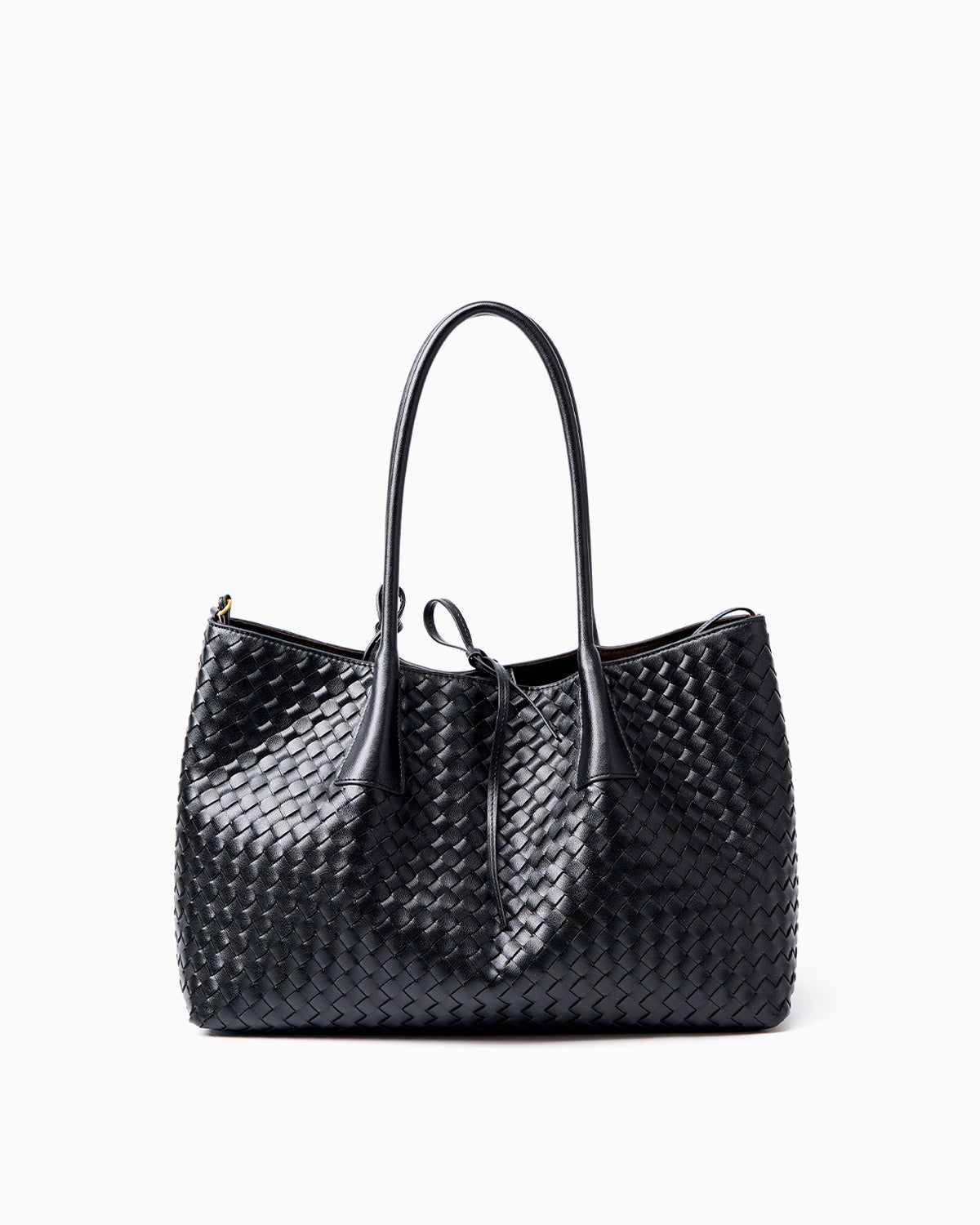 A black woven leather large tote bag with double top handles and a drawstring detail