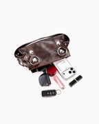What fits inside the Brown Vegan Leather Handbag with Oversized Rivet accents