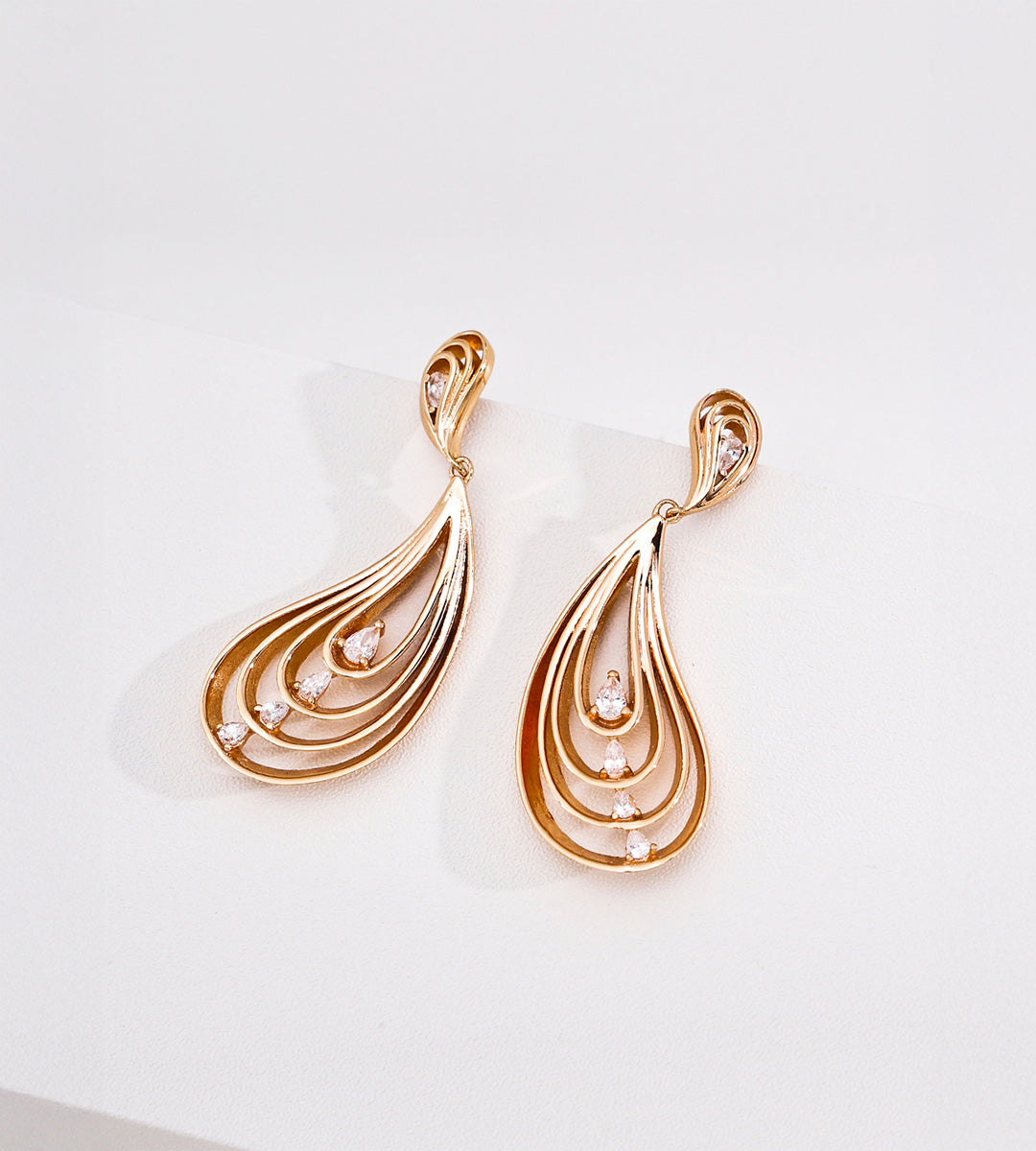 18K Gold-Plated S925 Silver Layered Wing Drop Earrings with small cubic zirconia accents, displayed on a clean white surface.