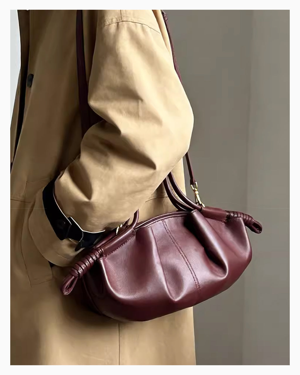 Woman in a stylish beige coat with a red pleated dumpling leather handbag with a knotted strap & detachable strap
