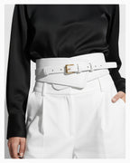 Model wearing 2‑in‑1 Women’s Leather Wide Transformable Statement Belt with Gold Buckle, White Color