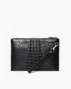 Black genuine Siamese crocodile-leather clutch bag with a wristlet strap and silver-tone hardware by BUCKLE Collective