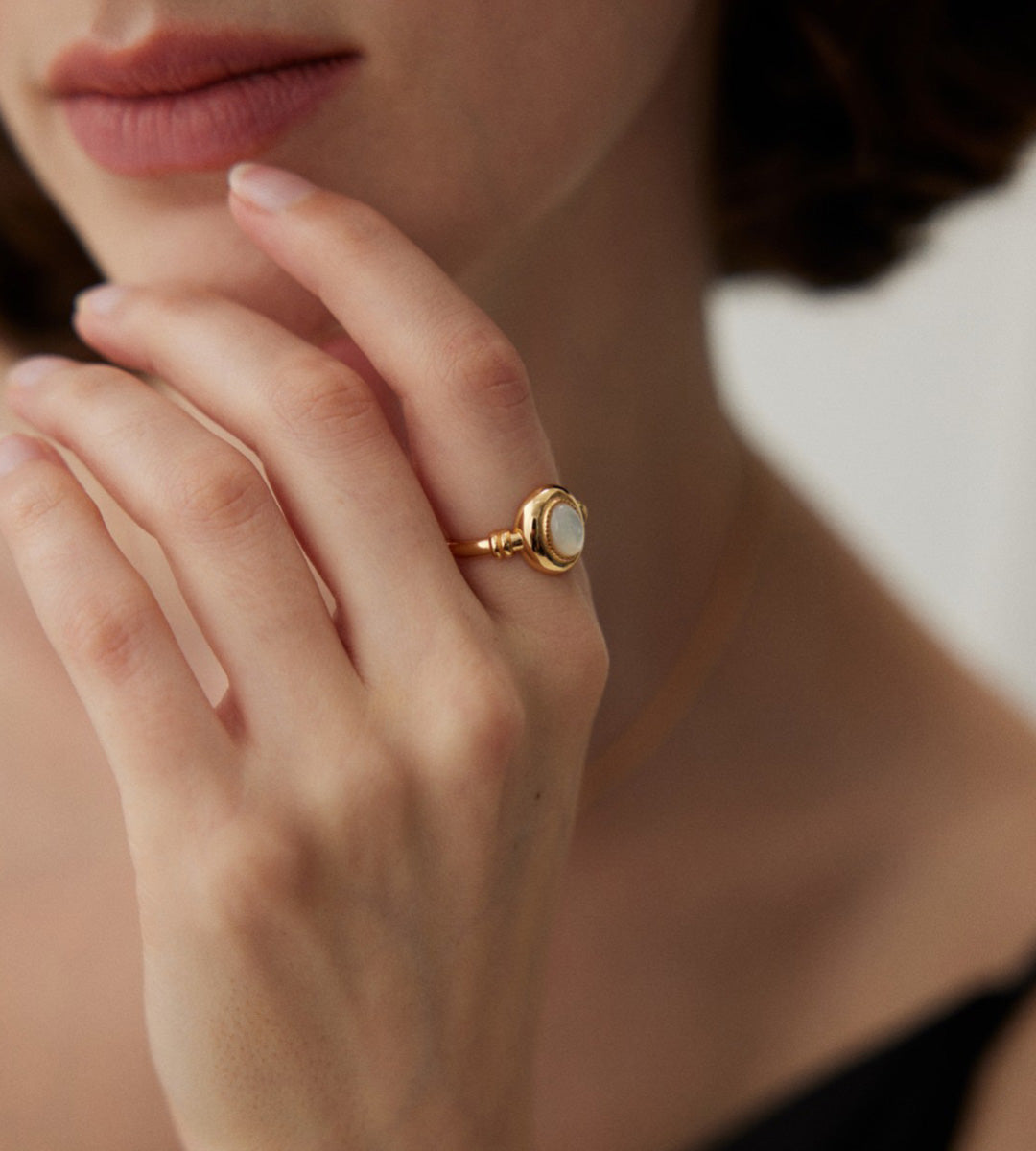 Model wearing an Elegant 18K Gold-Plated Mother of Pearl Ring, S925 Silver