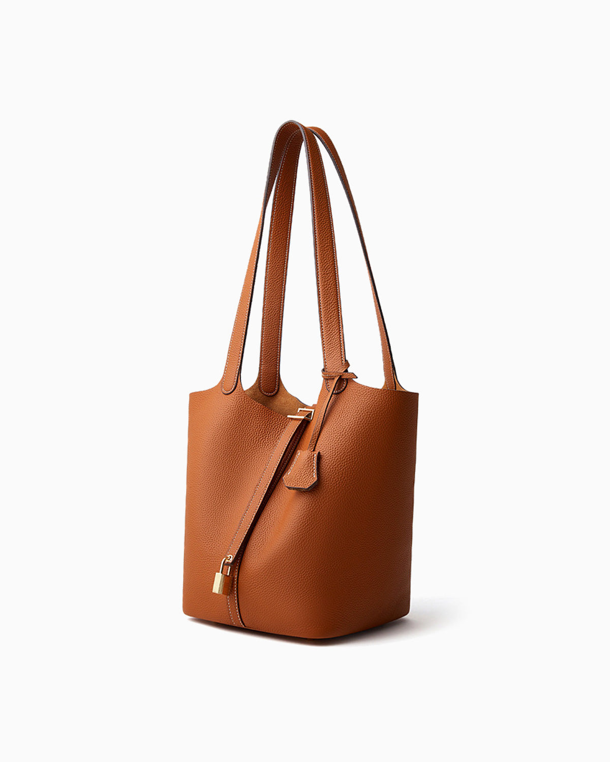 An Extra Large Togo Leather Bucket Tote Bag in Light Brown Color with Gold-toned Hardware and Lock shown from a 45-degree angle
