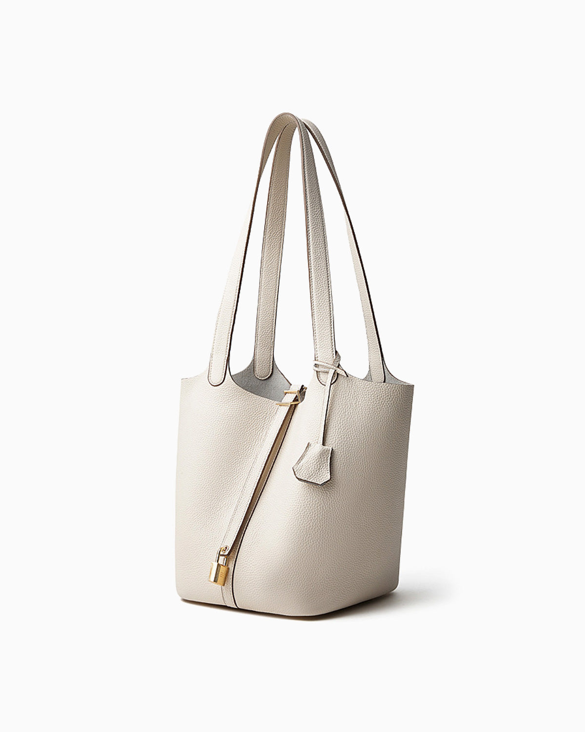 Extra Large Off-White Genuine Togo Leather Bucket Tote Bag with Gold-toned Hardware and Lock shown from a 45-degree angle