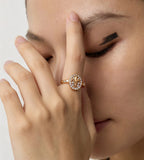 Woman wearing an 18K Gold Plated S925 Silver Fleur-de-lis Cubic Zirconia Open Ring