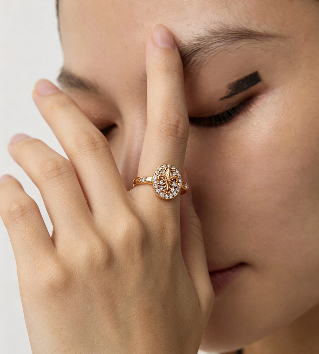 Woman wearing an 18K Gold Plated S925 Silver Fleur-de-lis Cubic Zirconia Open Ring