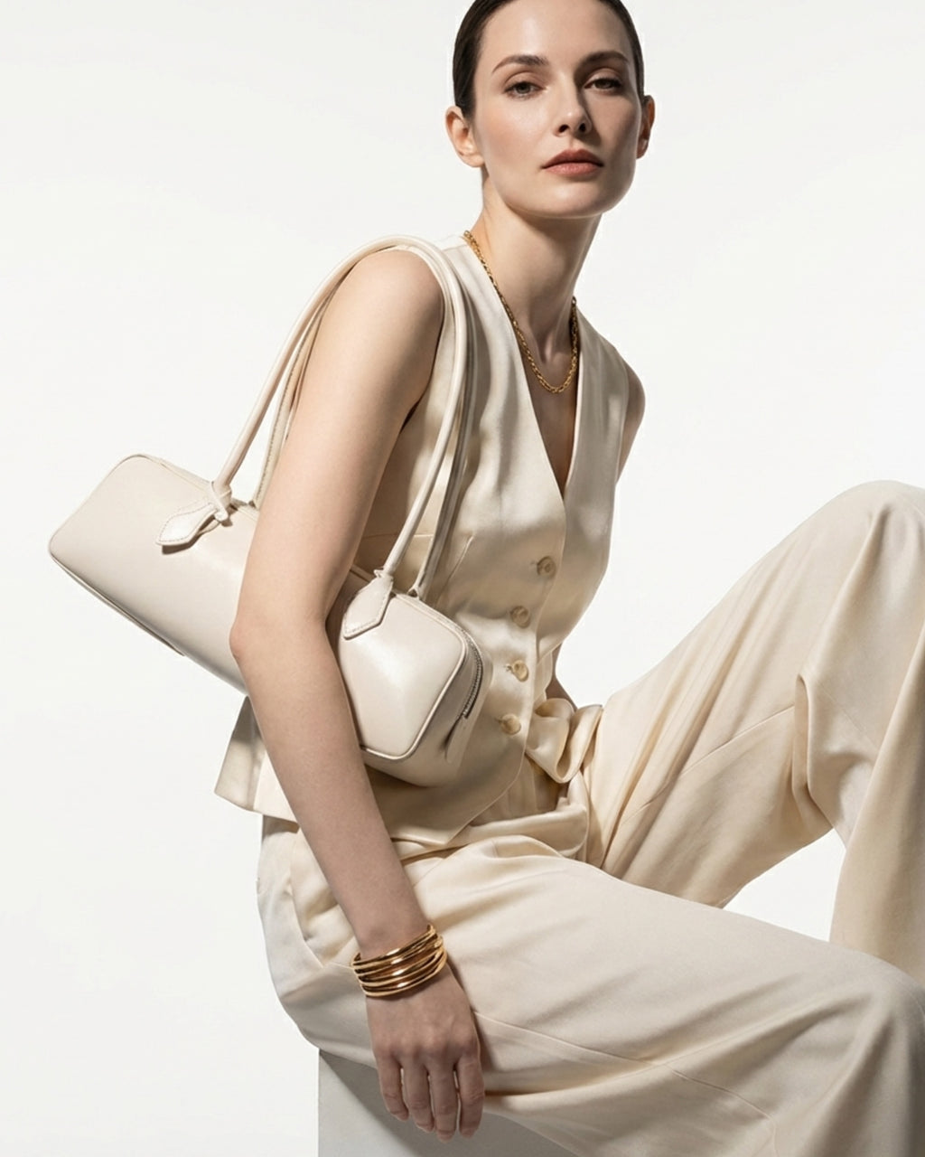 Stylish woman in a fashionable outfit wearing an Off-White Genuine Leather Baguette Handbag