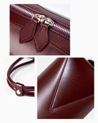 Texture and hardware details of the Leather Baguette Handbag
