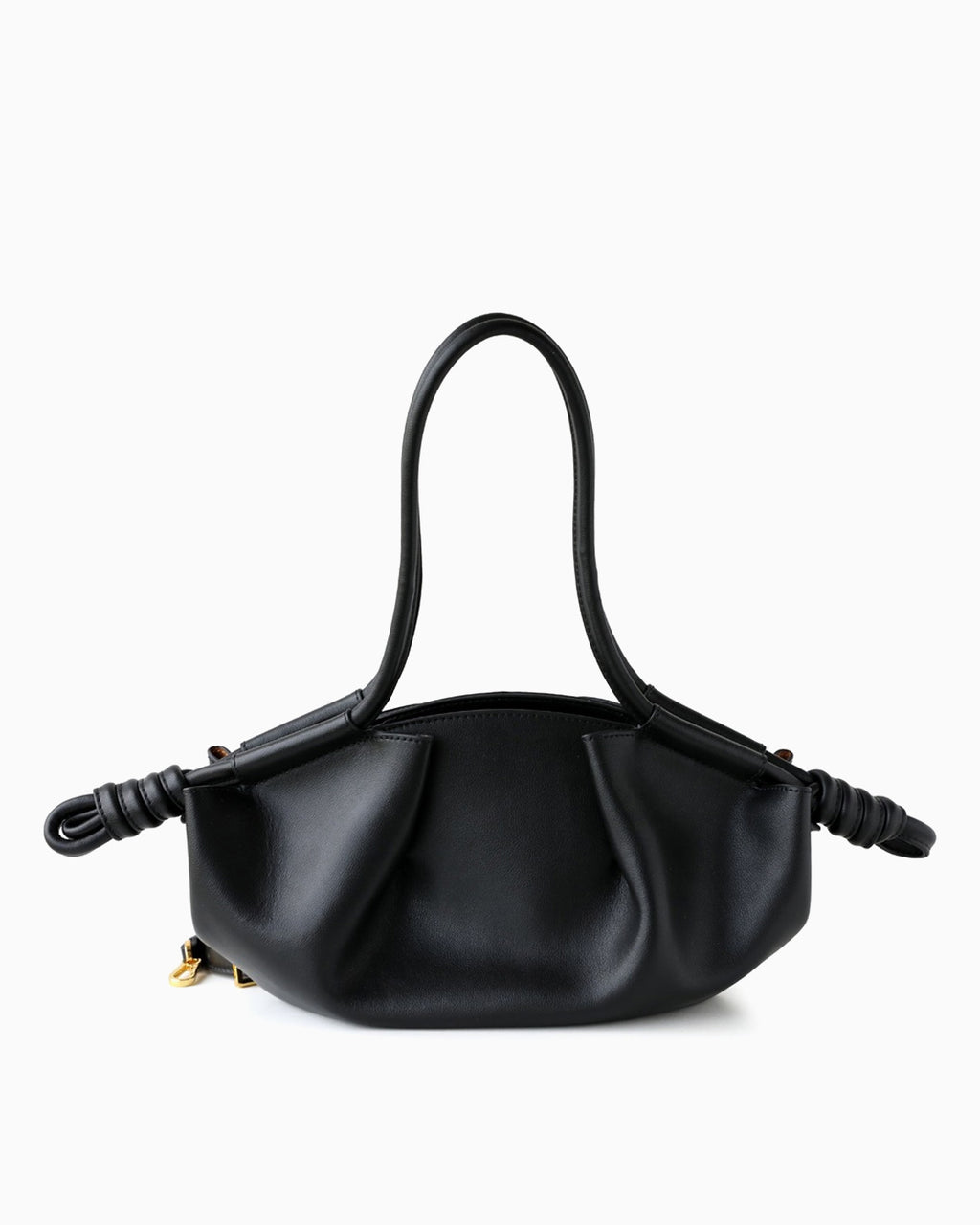 A black Dumpling Handbag with a unique twisted strap design on both sides and a small gold zipper pull by BUCKLE Collective