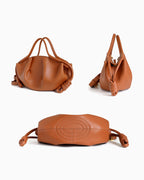 Dumpling Handbag with Knotted Strap shown from three angles: front, side, and top-down. The bag features a soft, slouchy silhouette with knotted leather handles and a quilted circular pattern on the bottom.