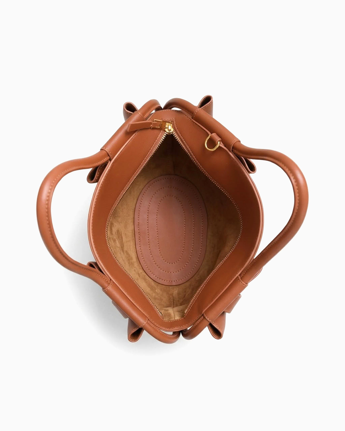 Top view of a brown leather dumpling handbag showing its interior, handles, and zipper closure | BUCKLE Collective
