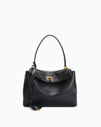 A black leather handbag with a top handle, a front flap featuring a gold-tone clasp, and a detachable shoulder strap, shown against a plain white background.