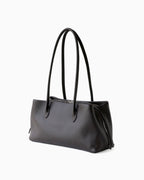 Dark Coffee Brown Genuine Full-Grain Leather Commuter Shoulder Bag with two long shoulder straps, shown from a three-quarters angle | BUCKLE Collective