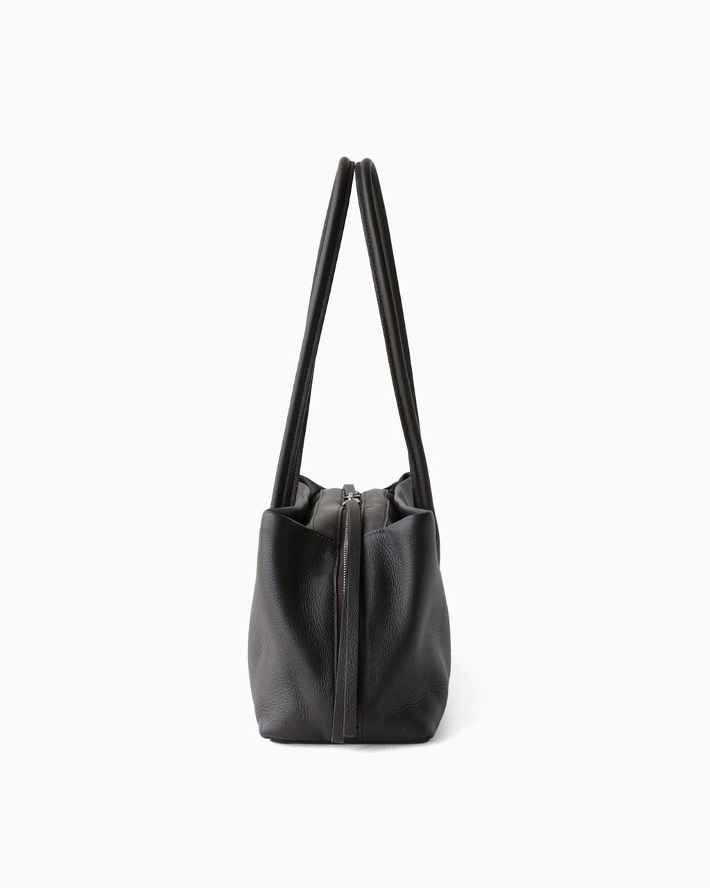 A side view on a Dark Brown Genuine Full-Grain Leather Commuter Shoulder Bag | BUCKLE Collective