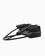 A side view on a Dark Coffee Brown Genuine Full-Grain Leather Commuter Shoulder Bag by BUCKLE Collective