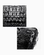 Leather texture and a removable wrist strap detail of the Black Genuine Siamese Crocodile Leather Clutch