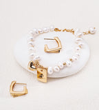 Square geometric hoop earrings in 18K vintage gold-plated S925 sterling silver, styled with freshwater pearl bracelet — open square hoop, stripe texture detail, BUCKLE Collective