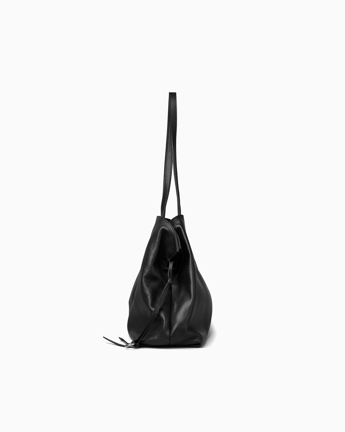 A black leather slouchy pebbled tote bag with double straps, shown from a side profile