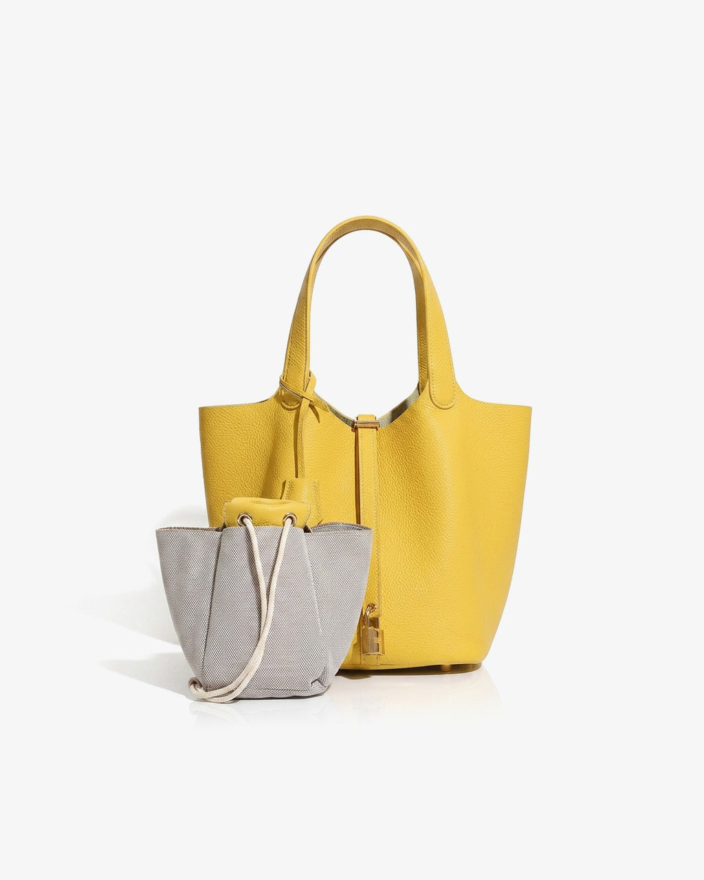 Large Genuine Togo Leather Bucket Bag in Yellow color with gold-toned Lock and a removable Pouch