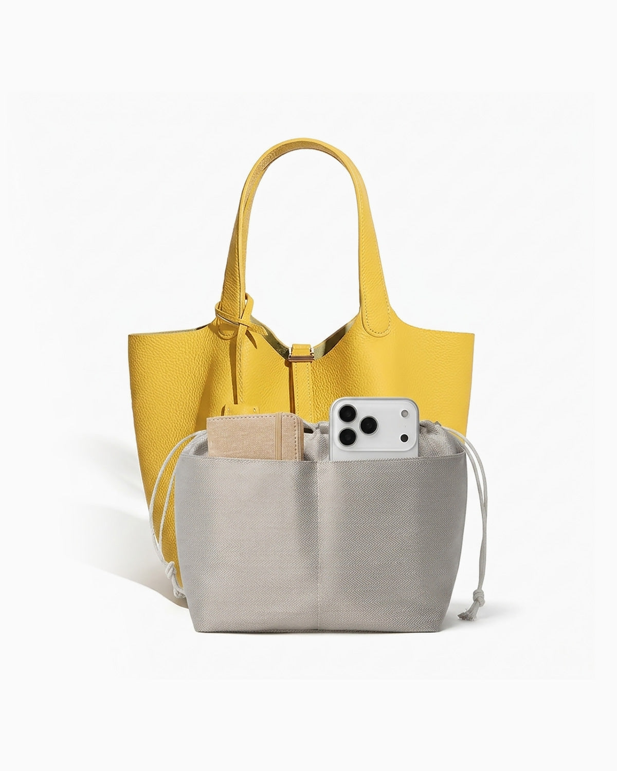 Large Genuine Togo Leather Bucket Bag in Yellow color with gold-toned Lock and a removable Pouch