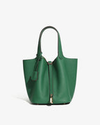 A Green Large Genuine Togo Leather Bucket Bag with Gold-toned Lock and Inner Pouch