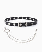 A black faux-leather collar with silver-tone metal studs, a buckle closure, and an attached silver chain with a ring clasp | BUCKLE Collective