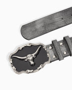 Belt with a decorative buckle featuring a longhorn design