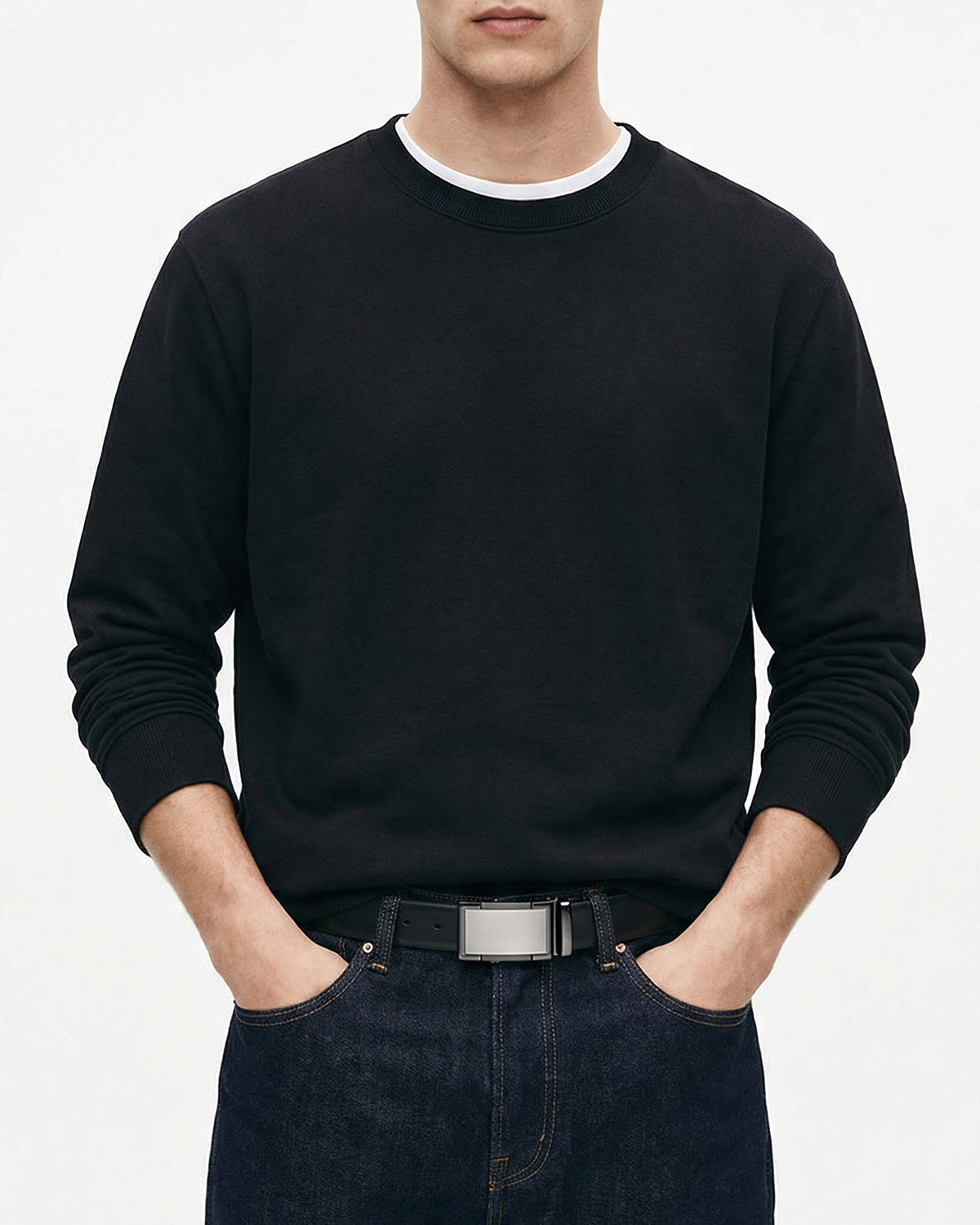 Man in a casual outfit wearing a Black Genuine Leather Ratchet Belt with Metallic Buckle | BUCKLE Collective