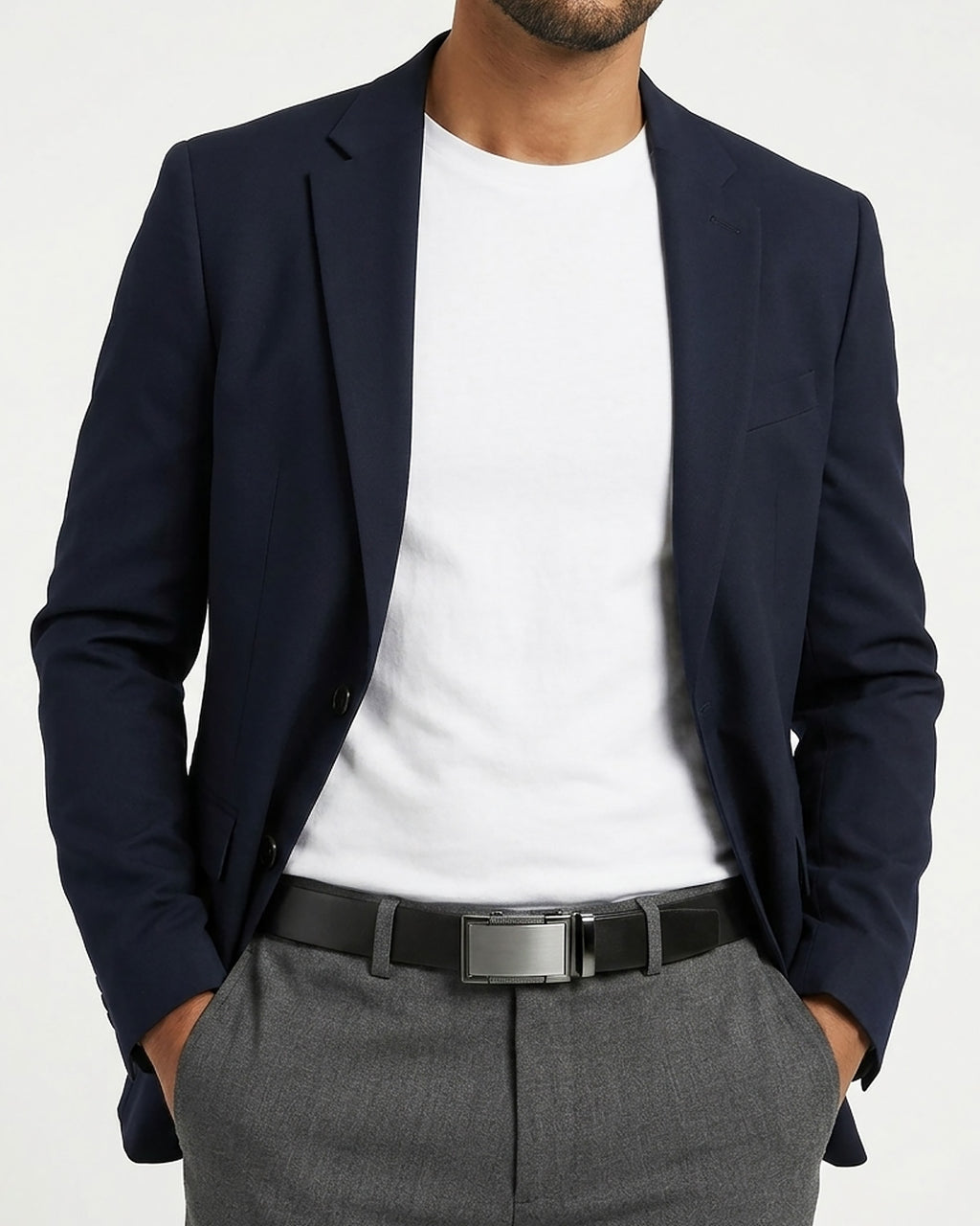 Man in a stylish smart-casual outfit wearing a Genuine Leather Ratchet Belt with Metallic Buckle | BUCKLE Collective