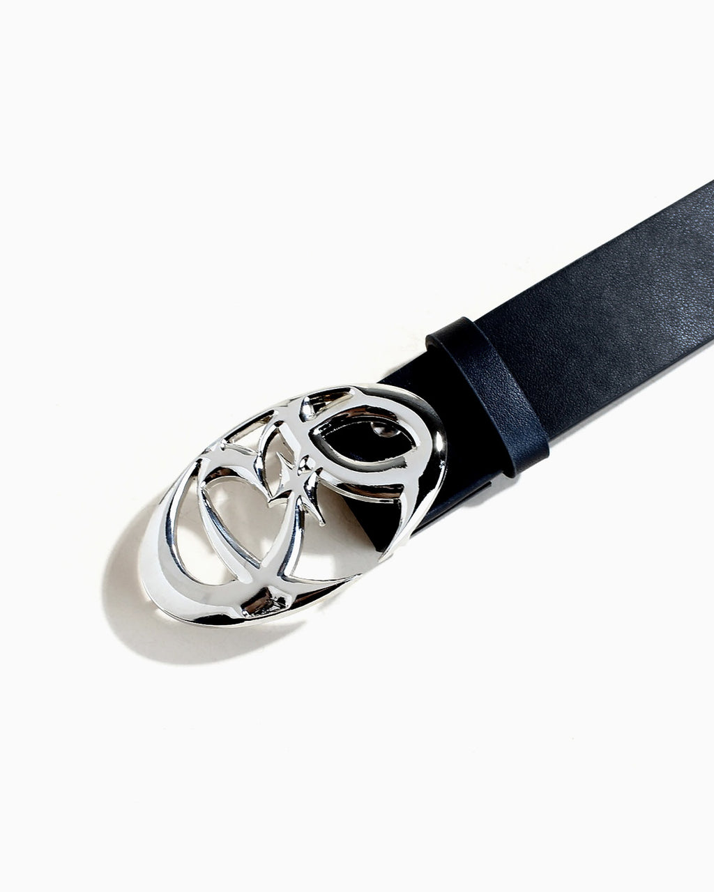 Y2K black faux leather belt with a large, polished silver-tone metal buckle featuring an abstract, interlocking geometric design