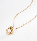 Flower natural pearl pendant necklace in vintage gold — sculpted floral frame with 6mm natural freshwater pearl, fine beaded satellite chain, adjustable 40cm+6cm, 18K gold plated S925 sterling silver, BUCKLE Collective