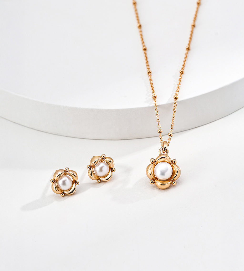 Flower natural pearl pendant necklace in vintage gold styled with matching floral pearl stud earrings — sculpted floral frame, 6mm natural pearl, beaded satellite chain, 18K gold plated S925 silver, BUCKLE Collective

