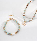 Natural Pearl Shoushan stone bracelet flatlay with matching starfish charm necklace — lobster clasp and 3cm gold extender detail, sky-blue stone beads and freshwater pearl, 18K gold plated S925 silver, BUCKLE Collective