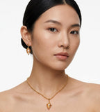Asian model wearing Ocean’s Whisper Conch Pearl Earrings and Necklace, 18K Gold-Plated S925 over Sterling Silver