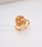 Sunny Daisy embossed open ring in vintage gold — 3D raised daisy blooms with engraved "sunny" lettering and pavé cubic zirconia accents on oval signet plaque, 18K gold plated S925 sterling silver, BUCKLE Collective