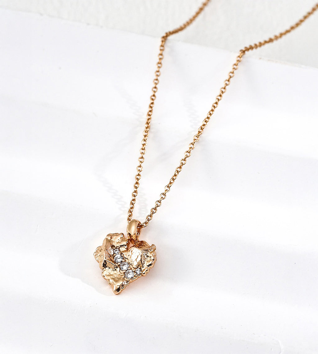 Rough rock textured heart pendant necklace in vintage gold — sculptural irregular surface with pavé cubic zirconia inlay, 18K gold plated S925 sterling silver, BUCKLE Collective