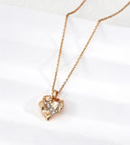 Rough rock textured heart pendant necklace in vintage gold — sculptural irregular surface with pavé cubic zirconia inlay, 18K gold plated S925 sterling silver, BUCKLE Collective