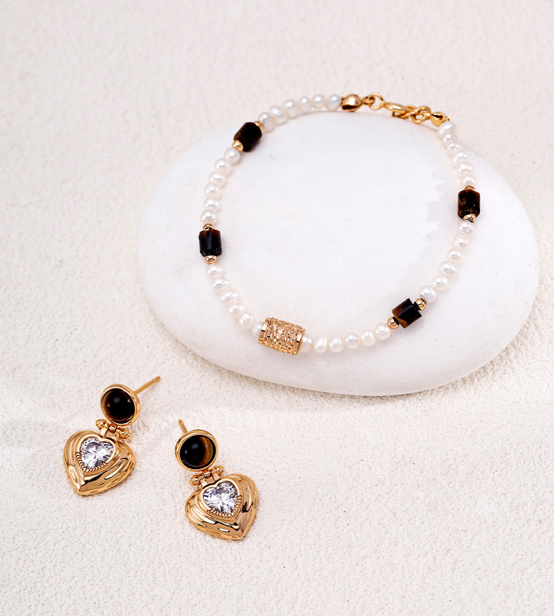 Tiger's eye CZ heart drop earrings and matching tiger's eye pearl bracelet jewellery set in 18K gold plating — S925 silver, vintage gold finish, BUCKLE Collective