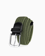 An army-green braided elastic belt with a black leather keeper and a silver-tone metal buckle by BUCKLE Collective