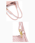 Texture and hardware details of Vegan Leather Woven Parachute Bag with Detachable Strap, Light Pink Color